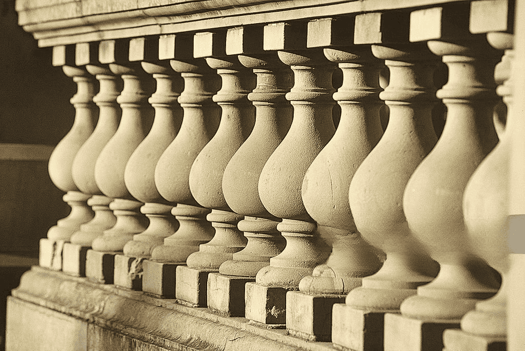 Traditional stone balustrade with carved natural stone balusters for exterior architectural design