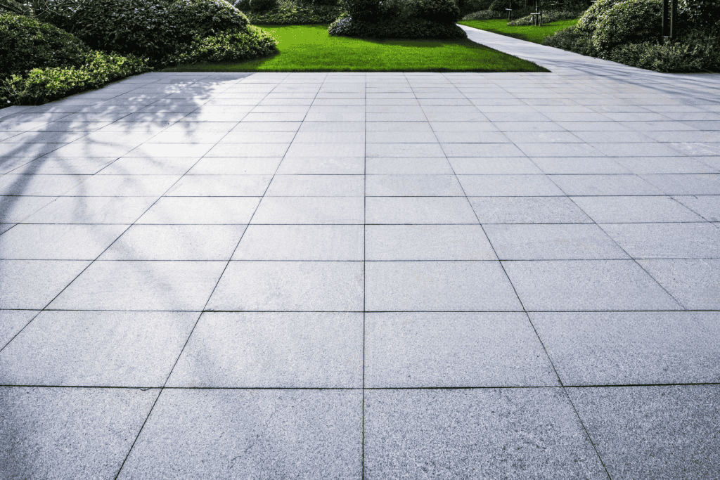 Modern outdoor space featuring durable granite paving tiles for landscape design